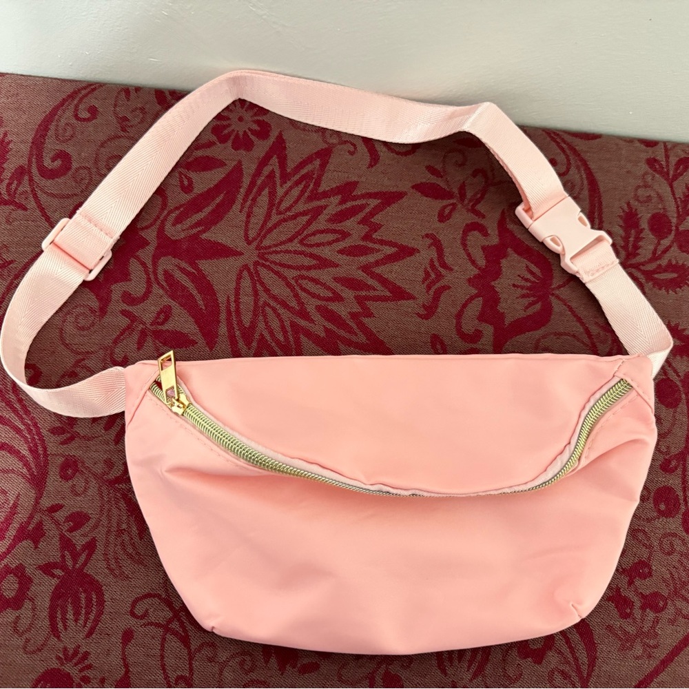 KAYMEY Women's Pink Fanny Pack with a gold buckle closure